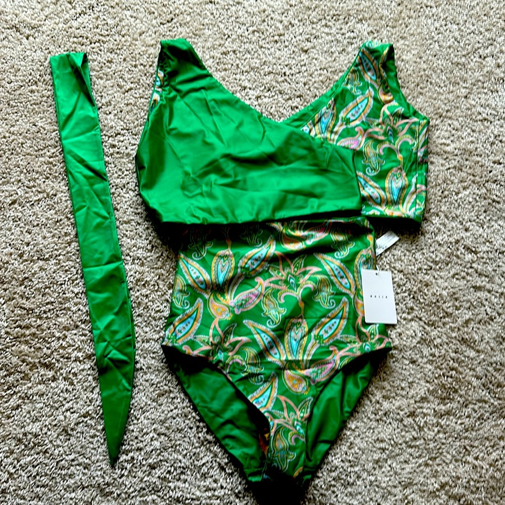 Baiia reversible 4 piece swimsuit, with 2 piece top, bottoms and sash.